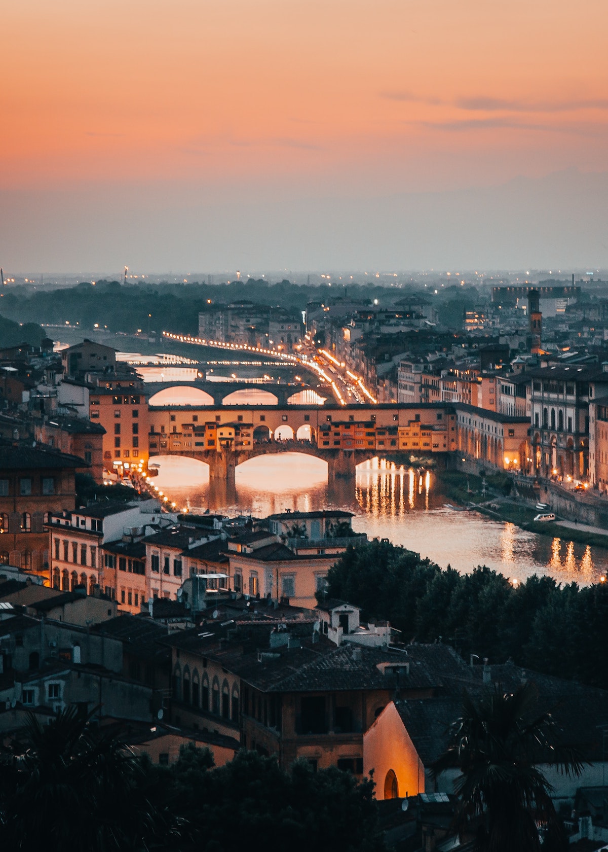 Bridges over the river in Florence, Italy at sunset