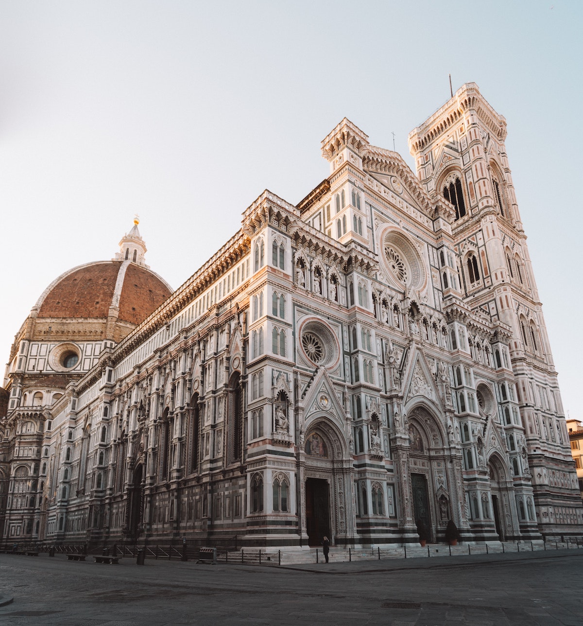 Cathedral in Florence, Italy with a large red dome in the background