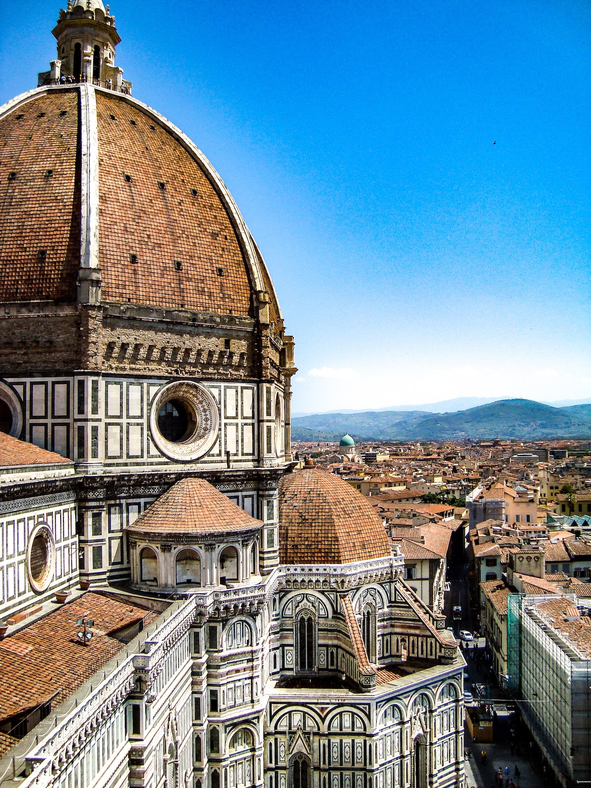 View of Florence, Italy's cathedral dome and the city beyond it on a clear day