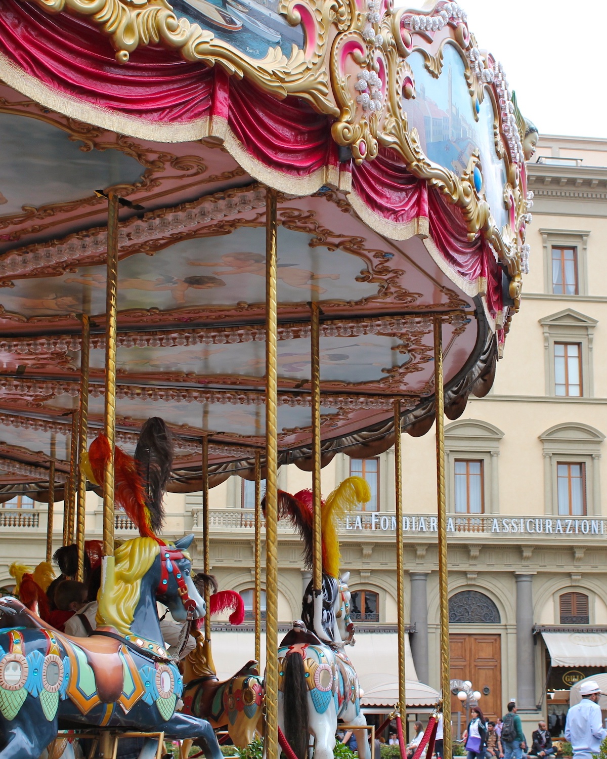 Colorful kids' carousel in Florence, Italy
