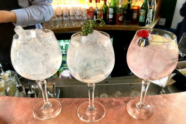 Make your own refreshing gin and tonic this summer, like one of the three pictured here! Our recipe is for a delicious version with cherry and ginger.