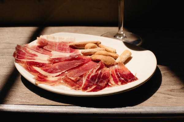 Jamón ibérico is no ordinary ham. The breed of the pig, its diet, and a careful aging process that takes years give it an absolutely heavenly flavor!
