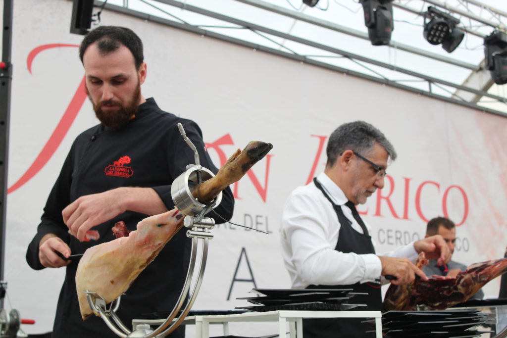 Ham slicing competition at the Feria del Jamon, Aracena.