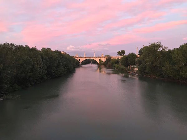 The Ponte Milvio bridge is one of the most Instagrammable spots in Rome, especially at sunset.