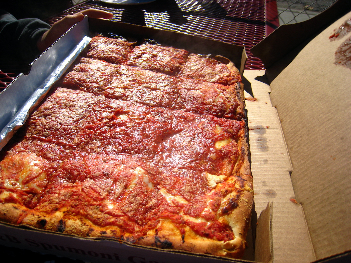 Sicilian style square pizza in a rectangular box