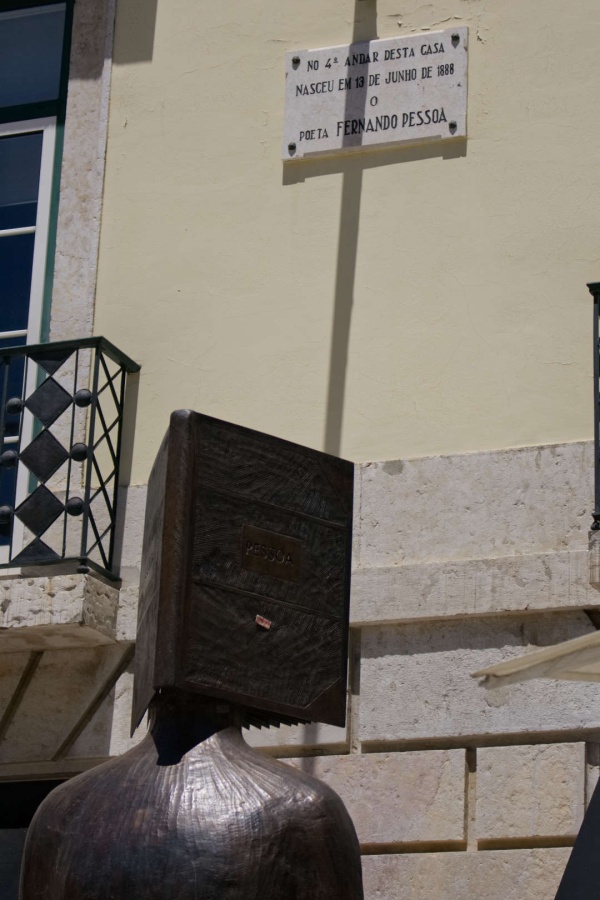 Get off the beaten path in Lisbon by checking out the lesser known statue of Fernando Pessoa near Lisbon's Opera House