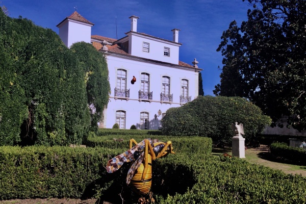 Giant ceramic creatures by Bordalo Pinheiro taking over a garden in Lisbon off the beaten path
