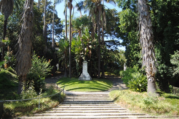 Tropical trees and staircase at the Jardim Botânico do Príncipe Real, one of the most famous Lisbon parks.