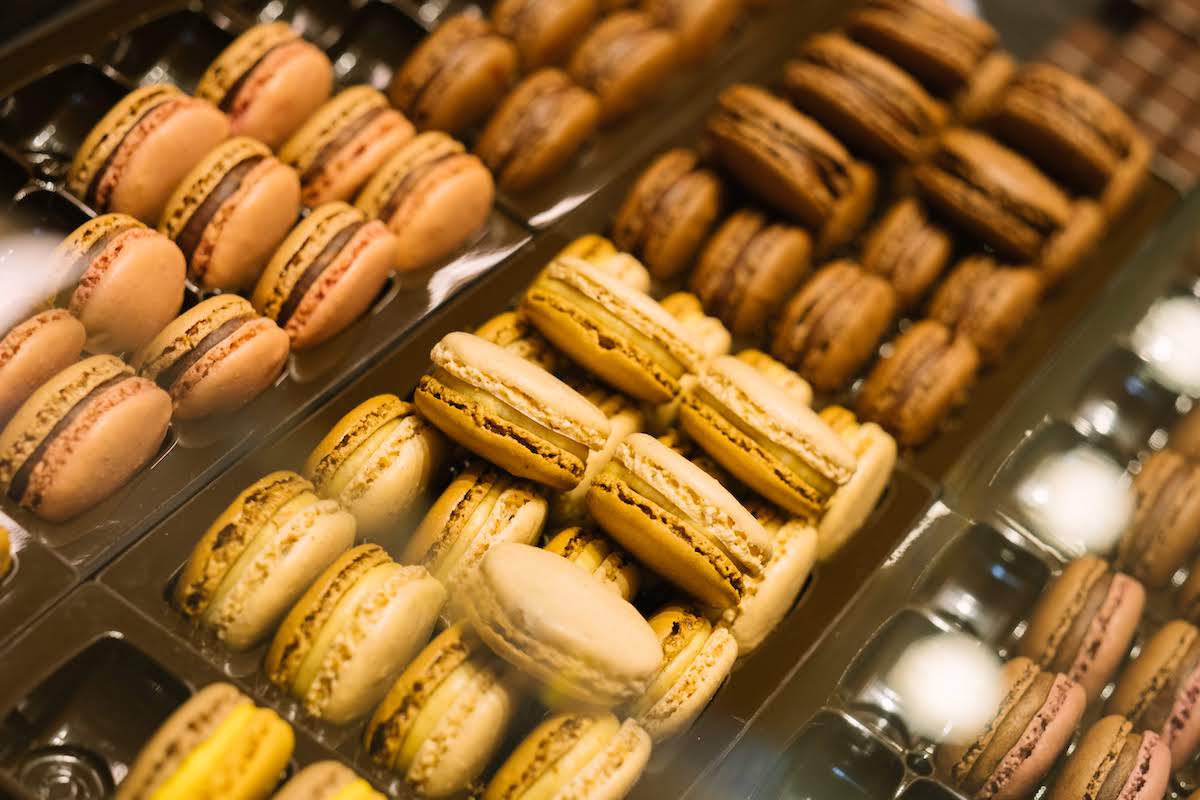 Yellow, brown, and orange macaron cookies