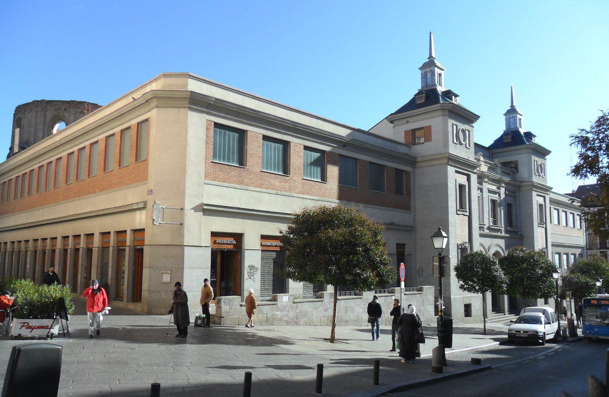 Exterior of a large food market building in Madrid.