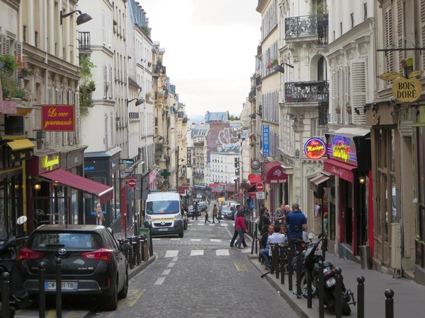 The Champs-Élysées is one of the biggest tourist traps in Paris. For an authentic look at Parisian life, check out the rue des Martyrs, pictured here, instead.