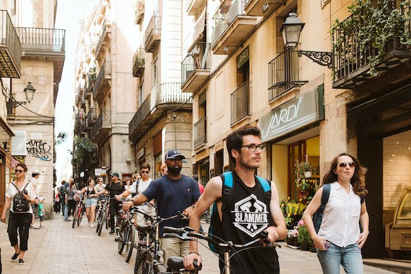 Walking bikes through central Barcelona