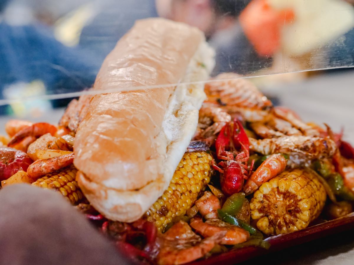 seafood boil tray with bread roll