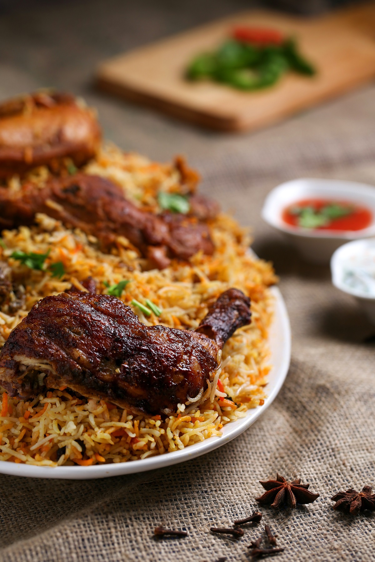 Heaping plate of spiced rice with roasted chicken