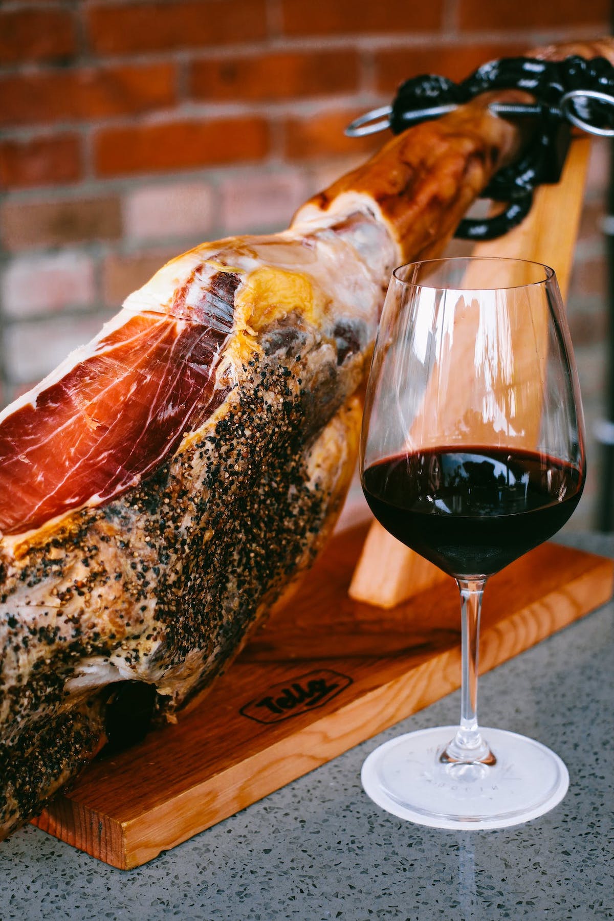 Buy jamón ibérico in Madrid and pair it with a glass of wine