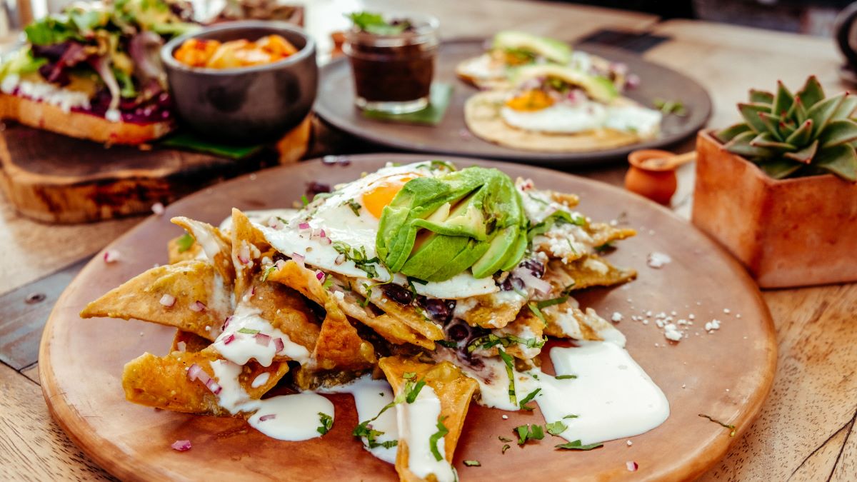 nachos with cream and avocado