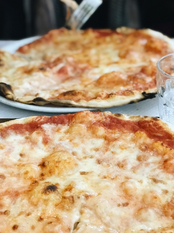 Eating pizza in Rome deserves a place on anyone's bucket list.