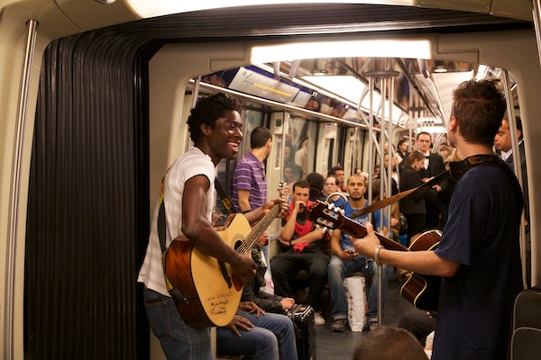 Buskers playing on the metro in Paris