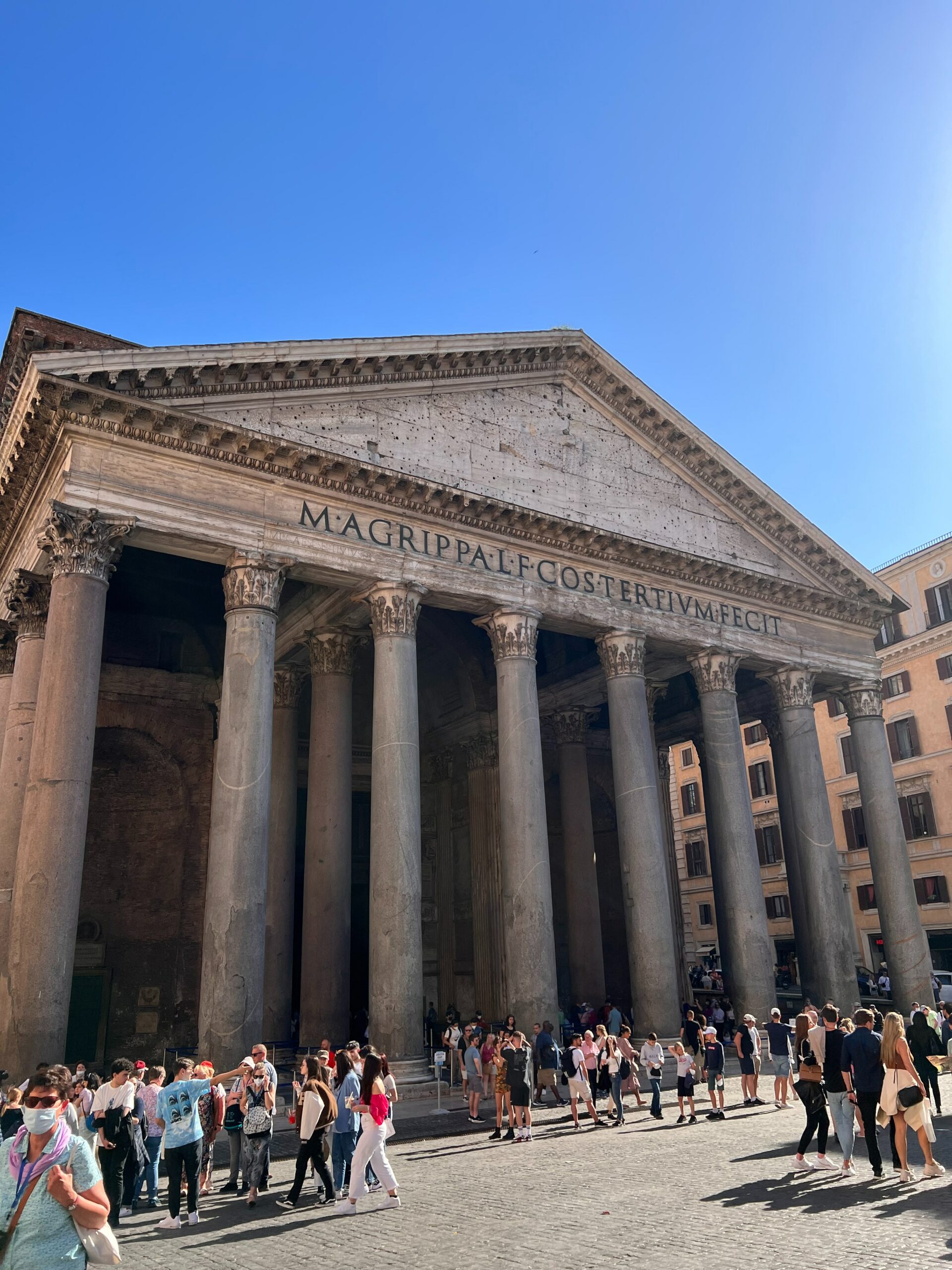 Pantheon in Rome with people walking outside