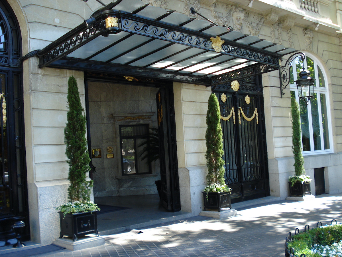 Front entrance of the Ritz Hotel in Madrid, with black wrought-iron architectural details.