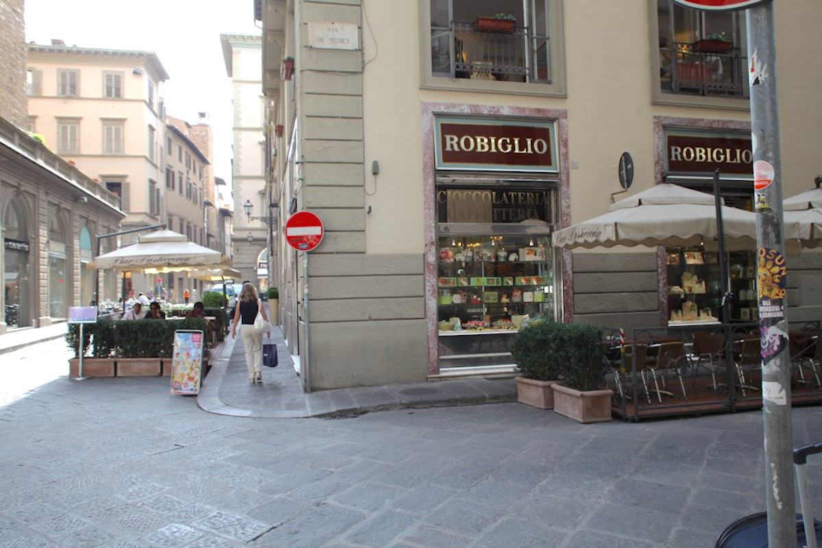 Exterior of a pastry shop on a street corner in Florence, Italy