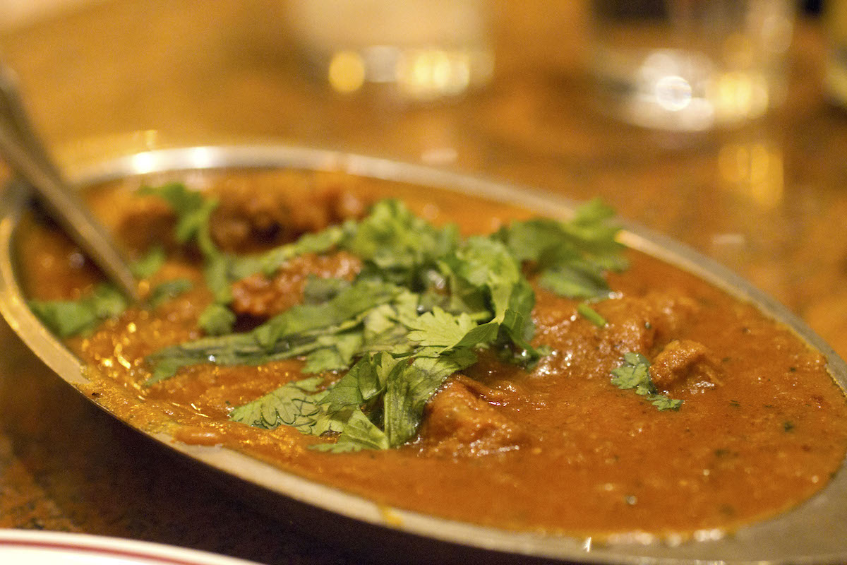 Lamb curry garnished with cilantro