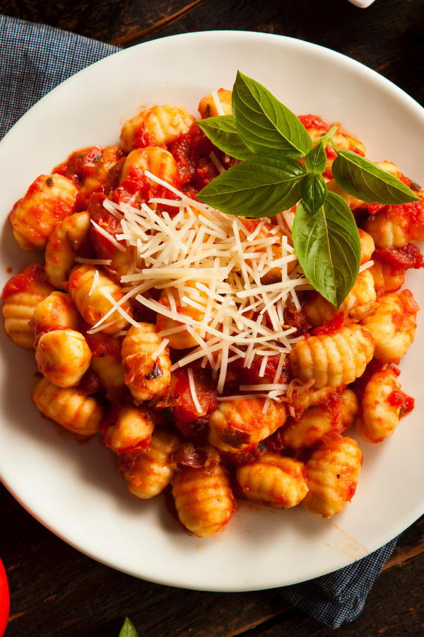 Gnocchi in tomato sauce with cheese
