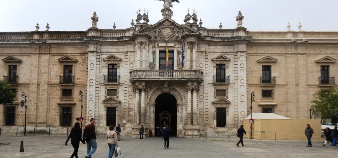 Exterior of large stone building in Seville, Spain