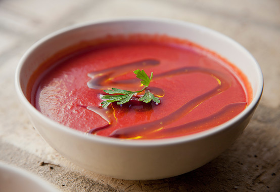 One of our favorite Spanish summer recipes is salmorejo. We eat this rich tomato soup non-stop during the summer, and love it garnished with ham and hard boiled egg.