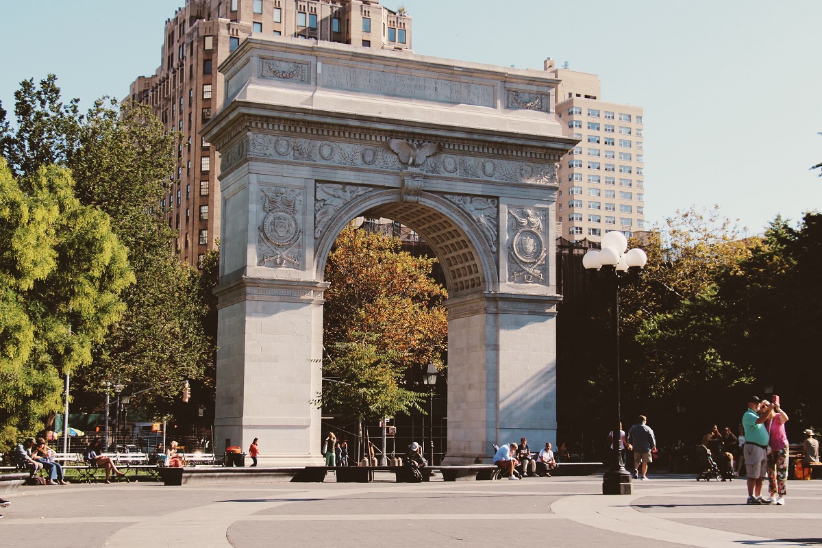 Iconic stone arch in Washington Square Park, one of the best parks in NYC