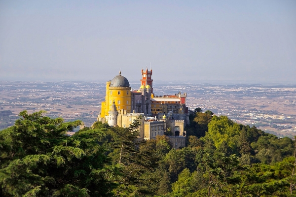 You have to see Pena Palace on a Sintra day trip.