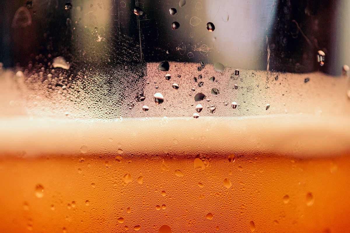 Extreme close up of a glass of beer