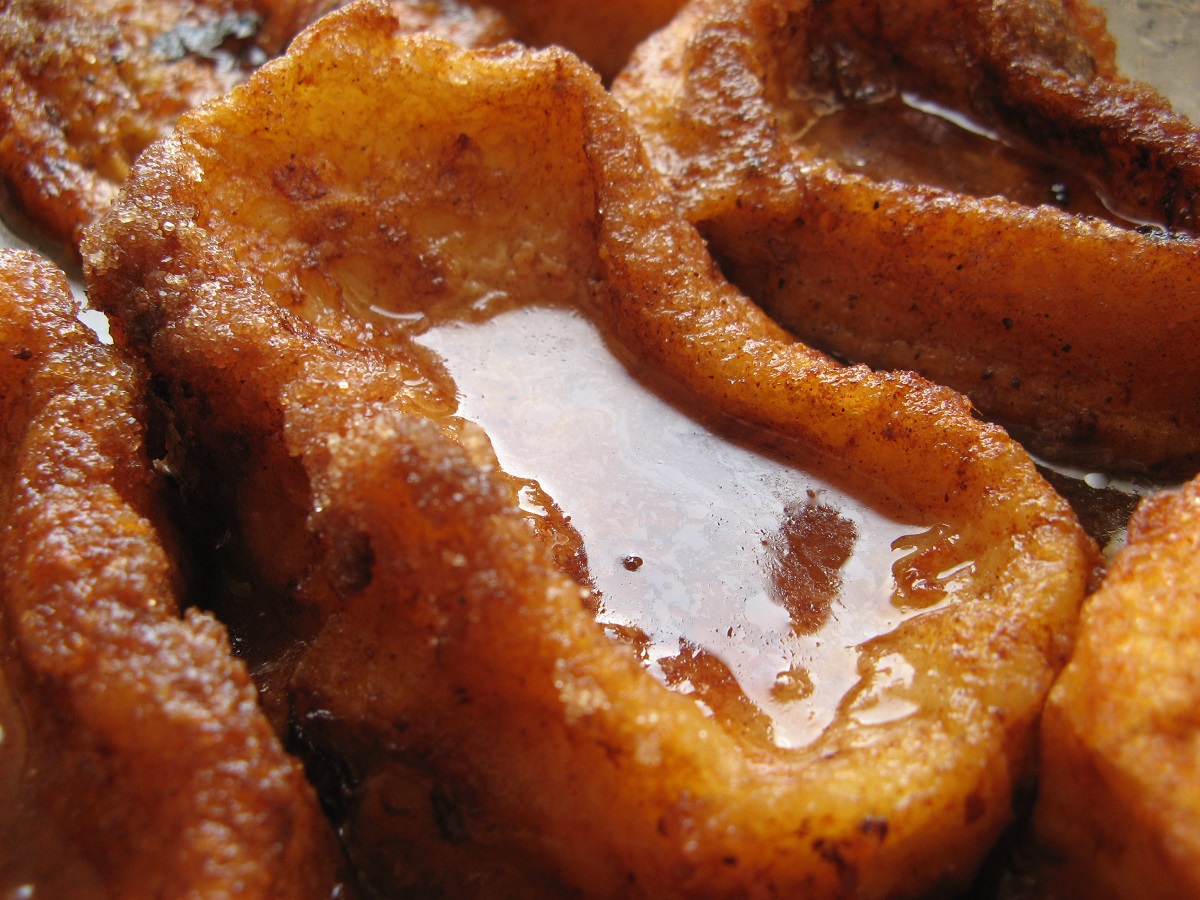 Close up shot of bread soaked in milk and honey, a traditional Spanish dessert during Easter