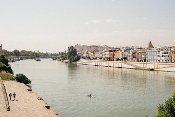 If you're visiting Seville in May, take advantage of the lovely weather to enjoy a boat ride along the river.