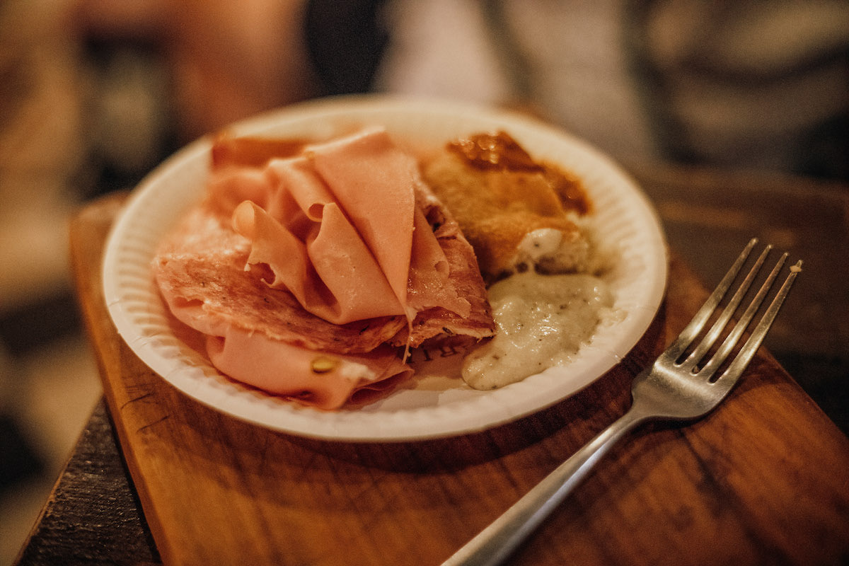 Close up of cold cuts on a white plate