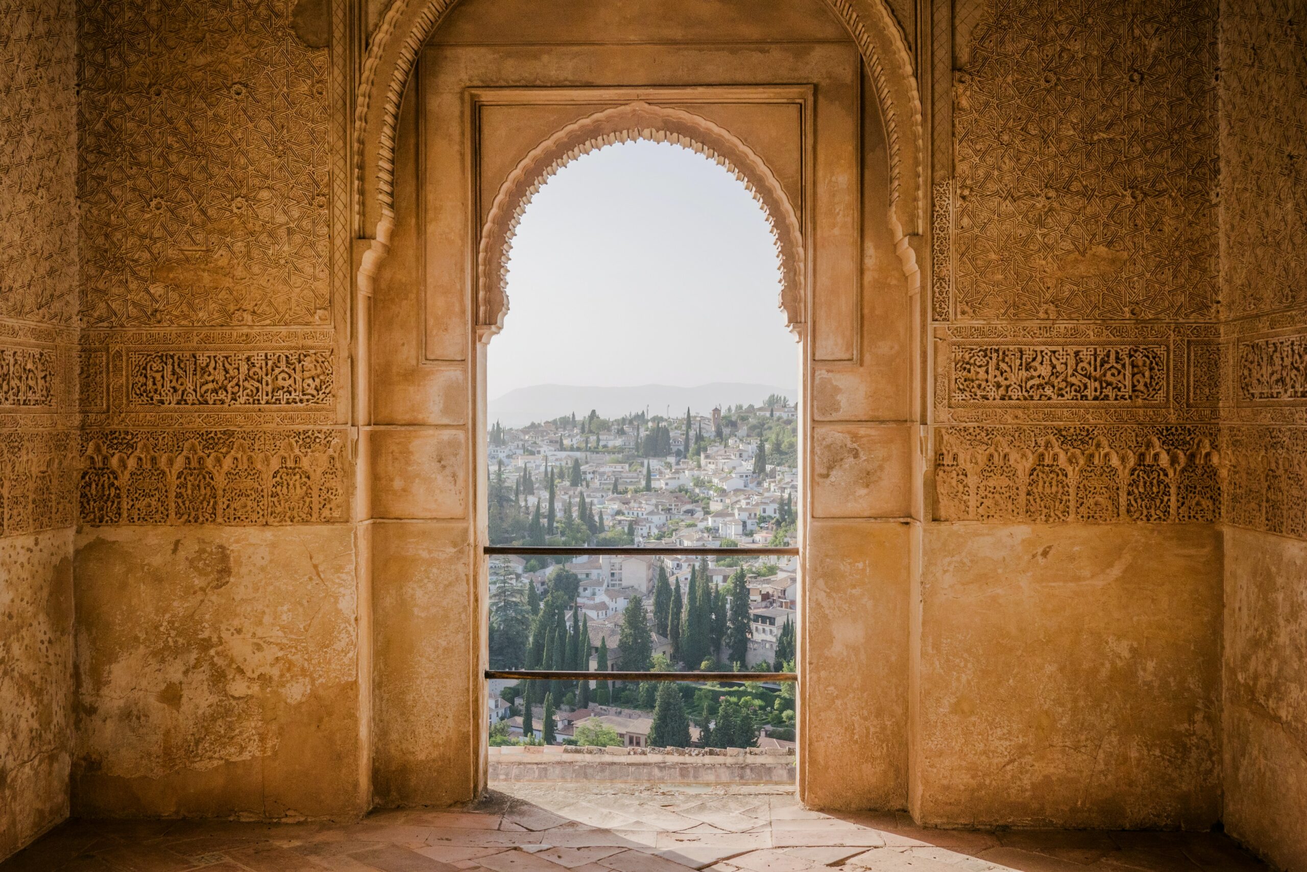 One of the arched doorways looking out into the horizon in La Alhambra