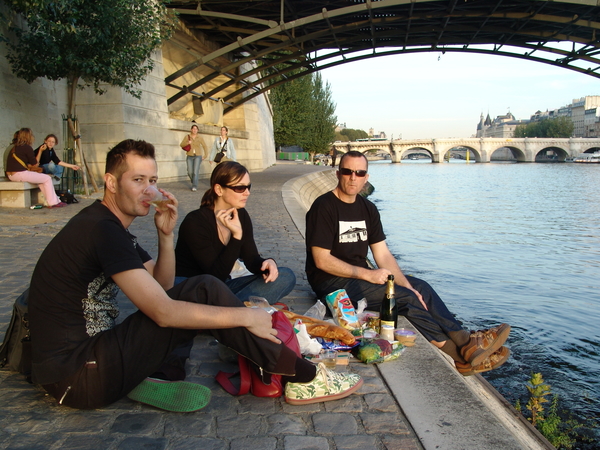 When visiting Paris on a budget, join the locals for a picnic on the banks of the Seine.