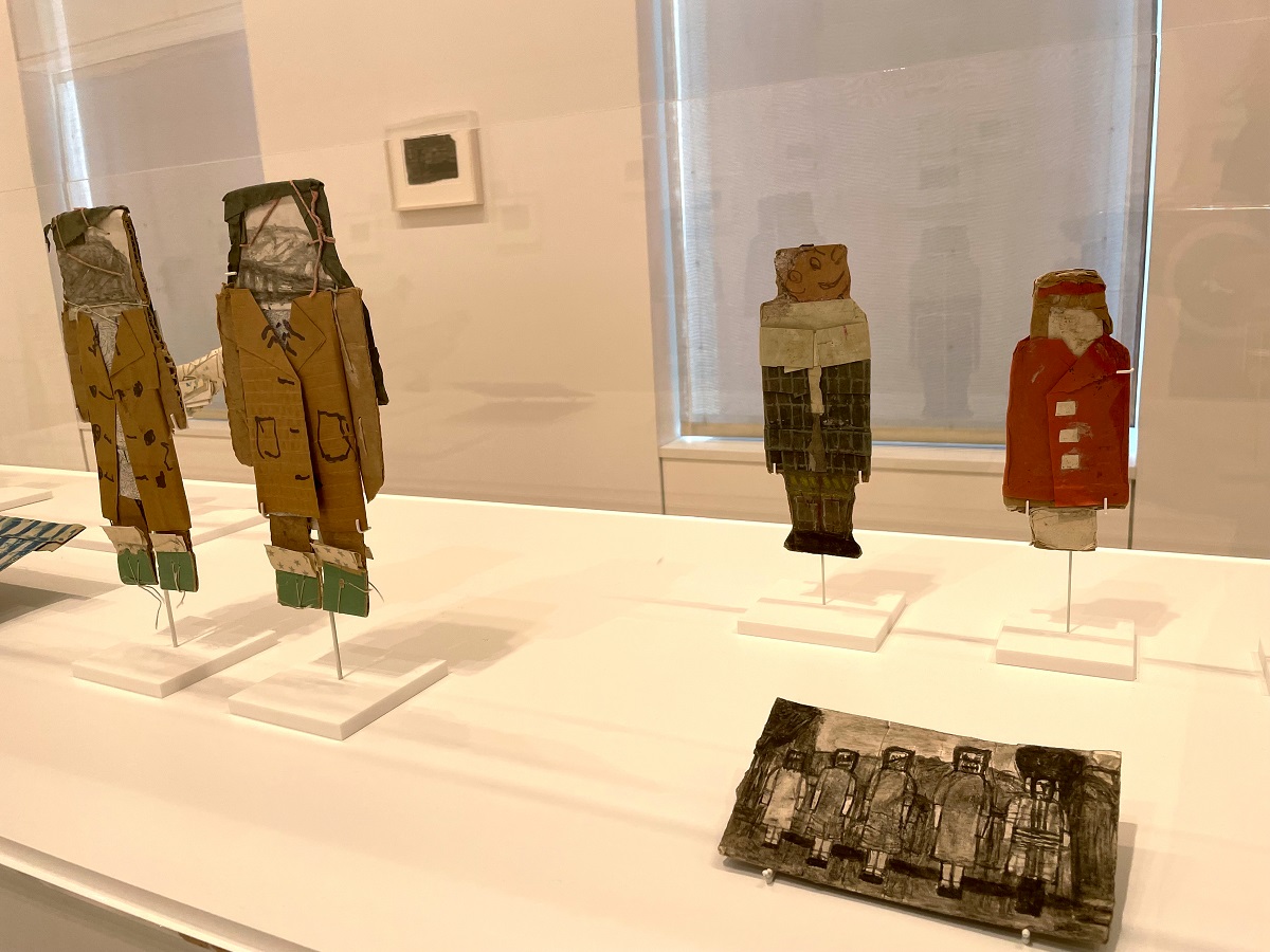 Paper dolls for sale at an art museum
