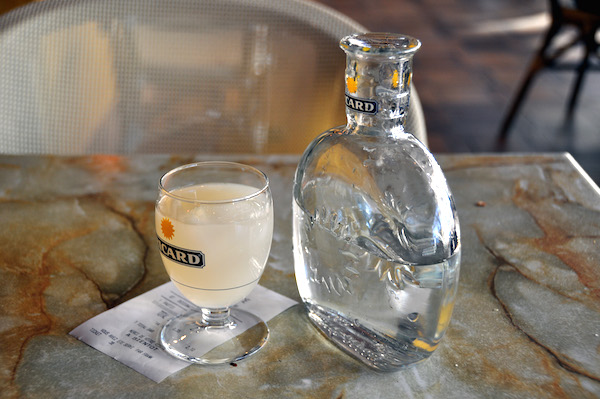 Pastis is a popular choice for what to drink in Paris.