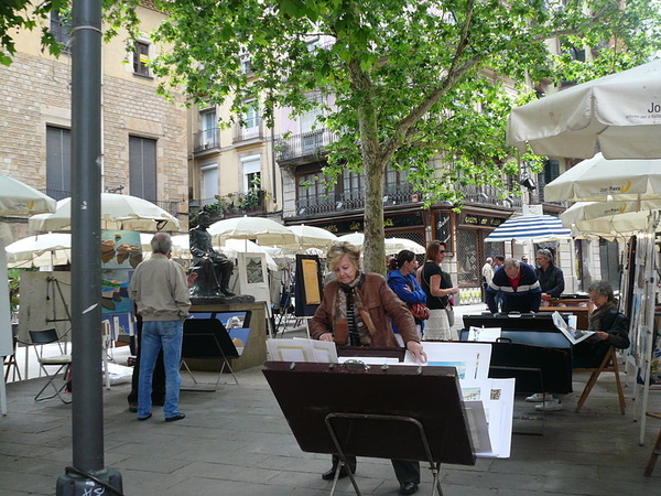 Not sure where to shop in Barcelona? Artsy Plaça de Sant Josep Oriol, home to a fabulous art market, is a great place to start.