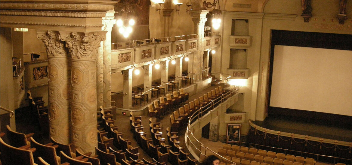 old theater hall with wooden chairs