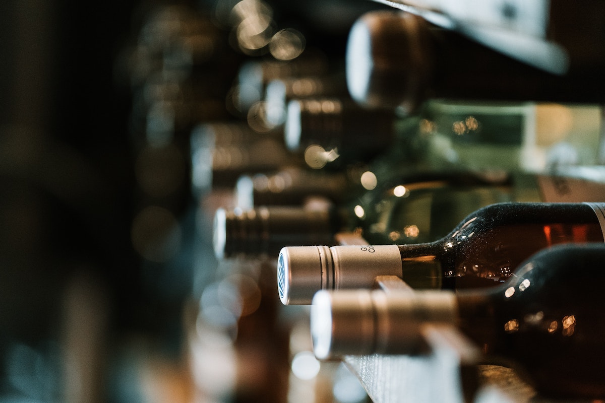 Close up of wine bottles on a rack